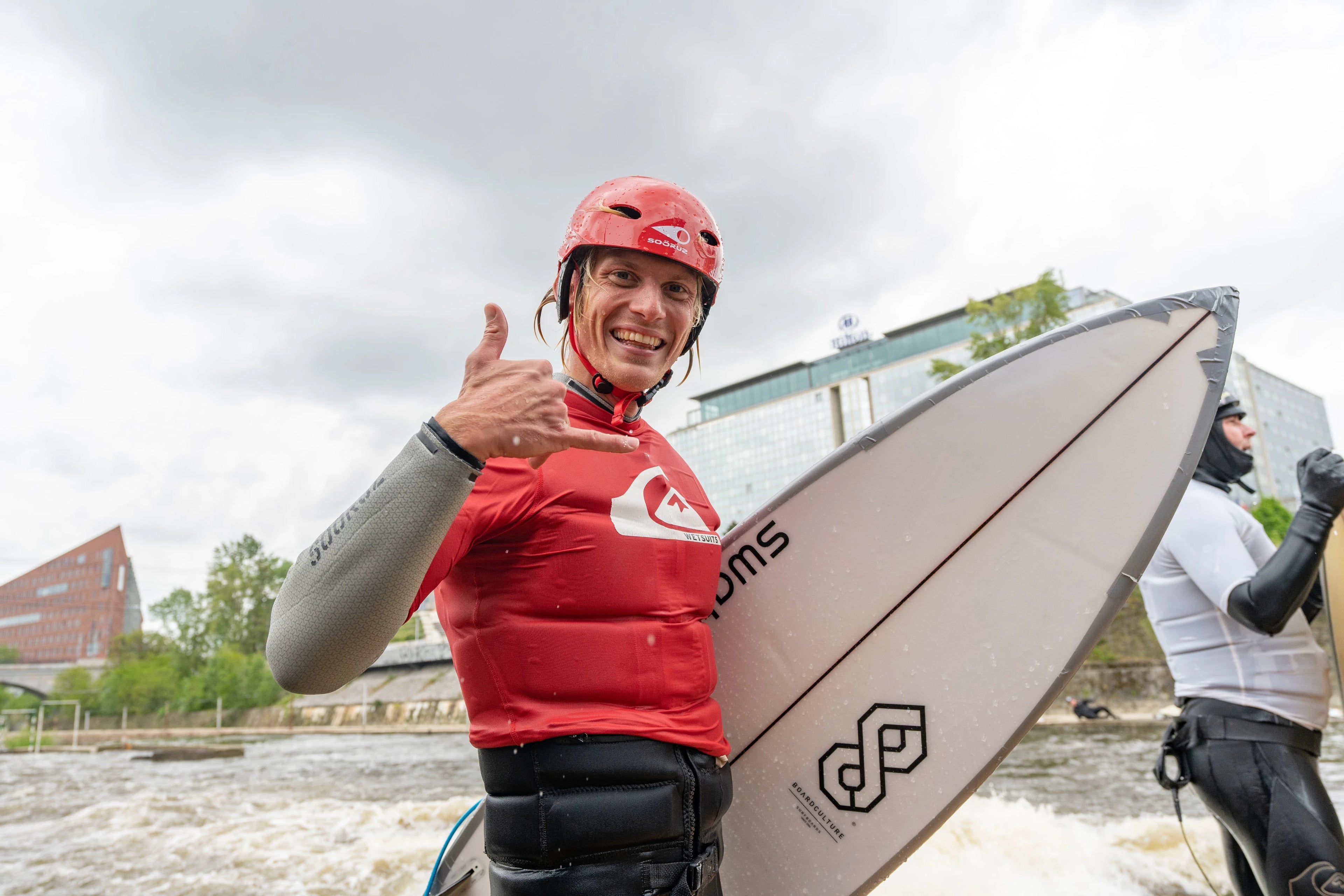 tony finfreaker surficata man surfer in red lycra