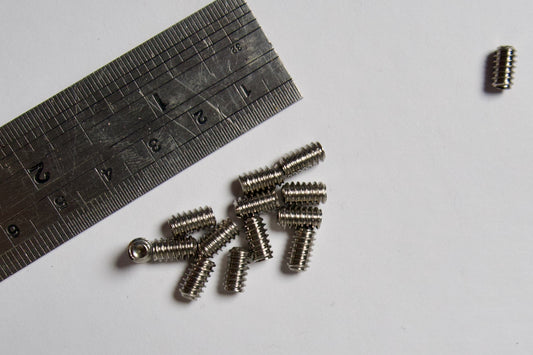 Šroubky pro finy a finboxy FCS (9mm), měřítko pravítko