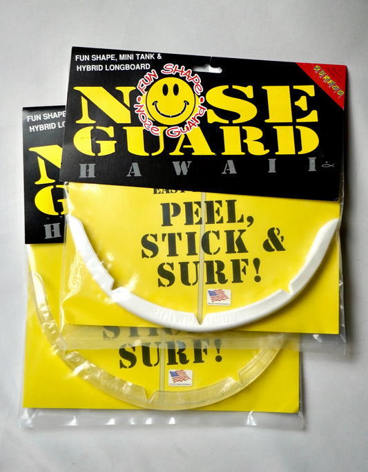 Balení SurfCo Hawaii Fun Shape Nose Guard Kit – bílé a čiré provedení v originálním obalu s nápisem Peel, Stick & Surf.