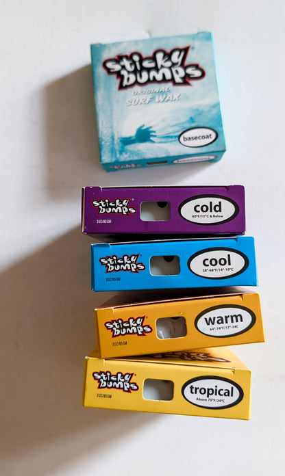 Set surfových vosku Sticky Bumps Tropical, Warm, Cool, Cold, Basecoat rozmazaný